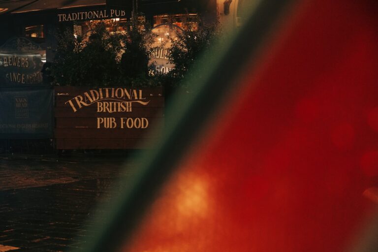 Traditional british pub food sign at night